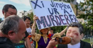 Protesters Demonstrate Against Chinese Communism During Xi's State Dinner