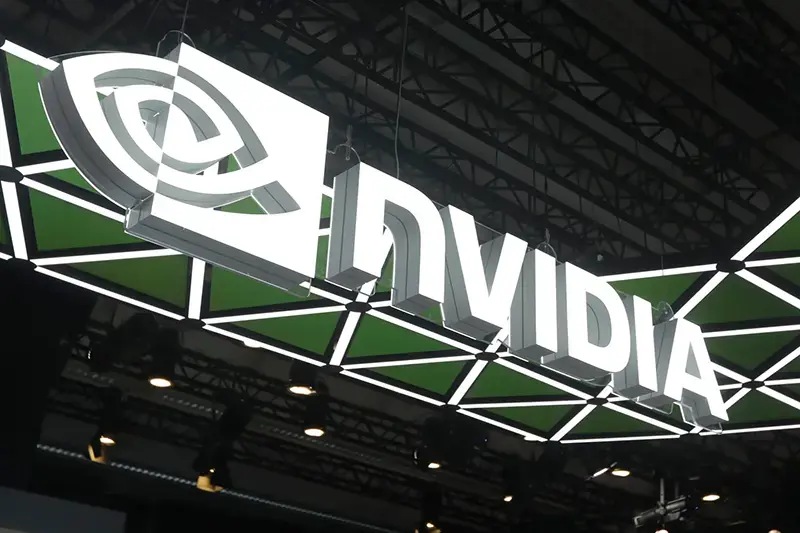 The image shows the NVIDIA logo prominently displayed at an event or trade show.