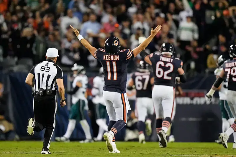 A Chicago Bears player celebrates on the field during a game.