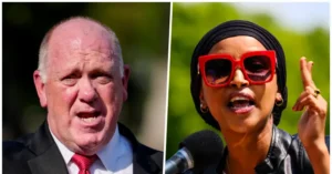 The image shows two individuals, one in a suit and tie and the other wearing a headscarf and red sunglasses, both appearing to be speaking or addressing an audience.