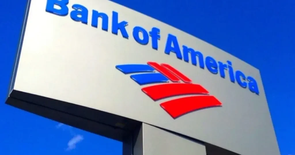 The image shows a Bank of America sign against a clear blue sky.