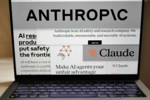 The image shows a laptop screen displaying information about Anthropic, an AI safety and research company, and its AI product Claude.
