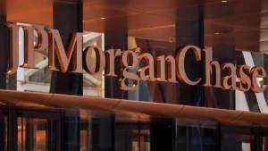 The image shows the JPMorgan Chase logo prominently displayed on the facade of a modern building.