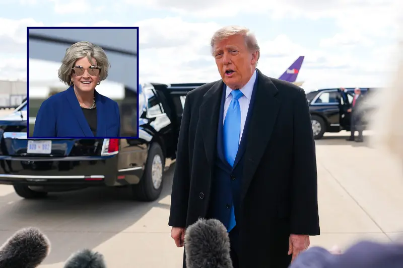 The image shows a man in a suit and tie speaking to reporters, with a vehicle and another person in the background.
