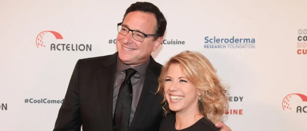 The photo shows two individuals posing together at an event sponsored by Actelion and the Scleroderma Research Foundation.