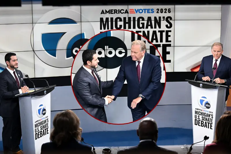 Two candidates shake hands during the America Votes 2026 Michigan's U.S. Senate Debate.