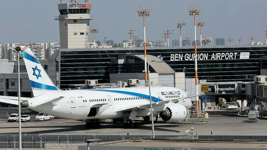 The image shows an El Al airplane parked at Ben Gurion Airport in Israel.