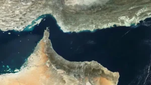 This satellite image shows the Arabian Peninsula, highlighting the Gulf of Oman and the Strait of Hormuz.