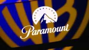 The image shows the Paramount logo with a mountain and stars design, set against a blue and yellow striped background.
