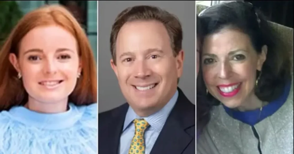 The image shows three individuals, two women and one man, dressed in professional attire, smiling for the camera.