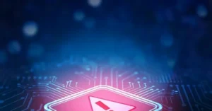 The image depicts a futuristic circuit board with a red warning symbol, set against a blue, bokeh-lit background, suggesting themes of technology and cybersecurity.