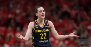 The image shows a basketball player wearing an Indiana jersey with the number 22, celebrating or reacting during a game.